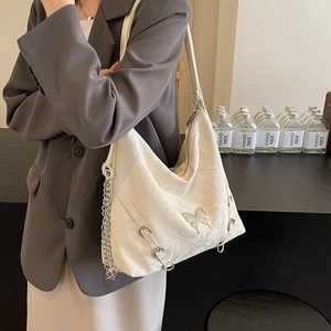 Versatile large capacity cream Hobo bag with butterfly buckle and metal chain for women