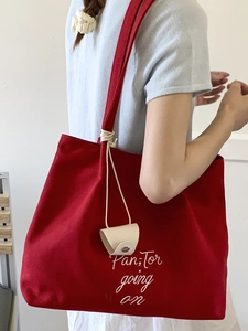 Stylish large red canvas tote bag with Pan-Tor embroidery for casual shoulder carry