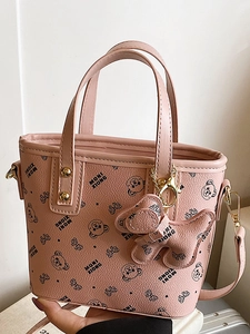 Pink leather handbag with bear print and adjustable strap for women in 2025 fashion