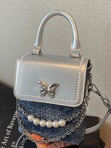 Silver and blue denim mini crossbody bag with butterfly ornament and pearl chain
