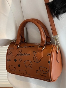 Chic brown Boston barrel bag with cartoon animal prints and adjustable shoulder strap