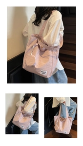 Pink waterproof nylon tote bag with round coin purse detail and casual textile label