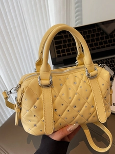Chic yellow quilted boston bag with sparkling rhinestones and detachable shoulder strap