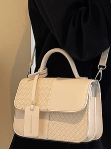 Fashionable cream beige patchwork crossbody bag with woven texture and top handle