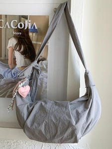 Minimalist grey large capacity hobo shoulder bag with a pink heart charm for women