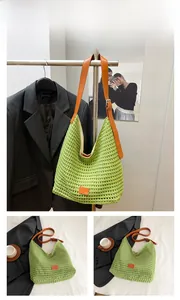Detailed shot of green woven tote bag featuring adjustable brown faux leather straps