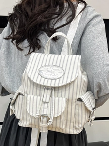 Sac à dos élégant en toile à rayures crème avec grand design pour un look décontracté