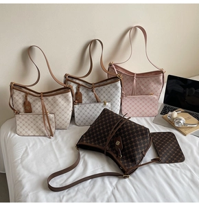 Detail view of retro patterned tote bag sets with matching pouches in four colors
