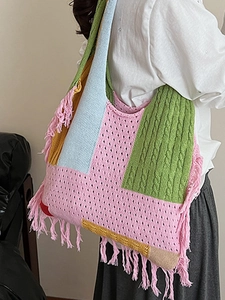 Boho knit shoulder bag with multicolored patchwork, fringe tassels and woven textures