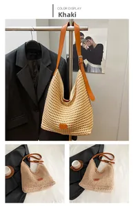 Detail view of the khaki woven hobo bag with adjustable brown leather shoulder strap