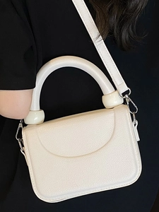 Minimalist white lychee leather mini square bag with round handle and detachable strap