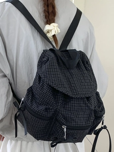 Sac à dos à carreaux noirs avec cordon et nœuds élégants pour femmes au quotidien