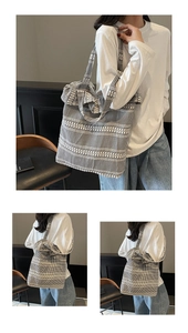 Detail of a large black and white gingham canvas tote bag showing the soft fabric texture