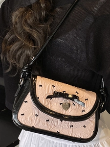 Sweet pink ruffled shoulder bag with black bow prints and heart metal charm for women