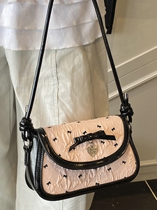 Sweet pink ruffled underarm bag with black bow and heart pendant for 2025 summer fashion