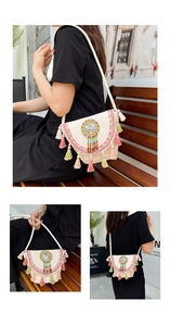 Detailed view of bohemian woven crossbody bag featuring colorful tassels and bead embroidery