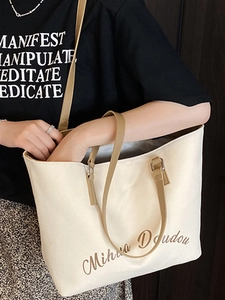 Grand sac cabas en toile beige avec anses en similicuir marron et imprimé lettres élégant