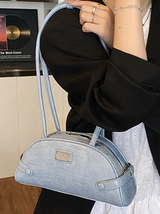 Elegant light blue crocodile embossed boston bag with shoulder strap and metallic logo