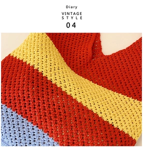Detail of colorful striped crochet bag showing intricate hollow-out knitting and vibrant colors