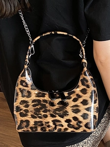 Leopard print crescent hobo bag with dual zippers and chain strap for women