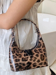 Fashionable leopard print handbag with glossy finish and metal chain detail for women