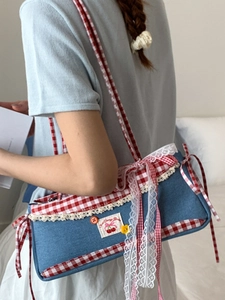 Sweet denim shoulder bag with red checkered ribbon trim and cherry applique detail