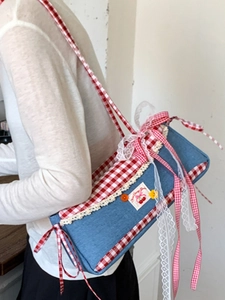 Retro denim crossbody bag with red plaid trim and lace bows for a sweet vintage aesthetic