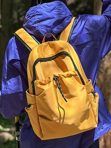 Waterproof yellow nylon backpack with multi-pockets for commuting and outdoor travel