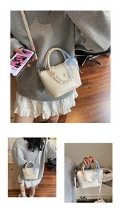 Detailed view of cream crossbody bag featuring lace trim and a blue checkered bow handle