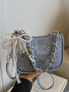 Sac bandoulière chic en denim style punk avec clous, nœuds en dentelle et perles