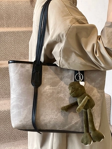Commuter large tote bag in grey stone pattern with black trim and green frog charm
