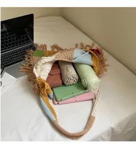 Detail showing the large interior capacity of this colorful crochet knitted tote bag