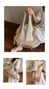 Macro shot of colorful bohemian knitted tote bag with fringe details and woven patterns