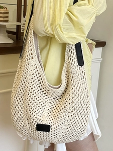 Chic cream woven knit tote bag for women featuring stylish black leather accents