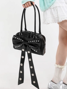 Chic black handbag with a large bow and silver rivet studs, stylish PU shoulder bag