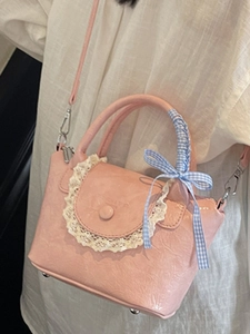 Pink PU leather crossbody bag with lace trim and ribbon handle for women