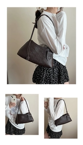 Detailed close-up showing the classic hand-woven grid texture of a deep brown shoulder bag