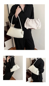 Detail of woven cream shoulder bag with intricate texture and matte faux leather finish
