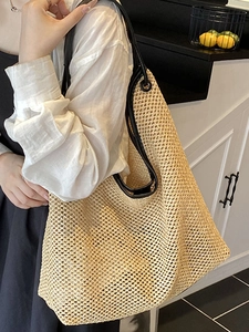 Retro hollow woven tote bag with large capacity and black leather straps for beach vacation