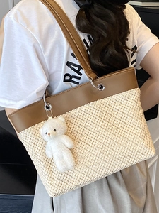 Fashionable straw patchwork tote bag with brown leather and cute bear charm pendant