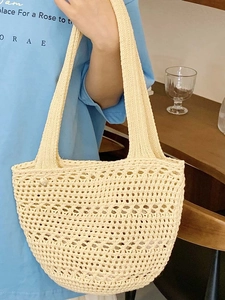 Minimalist beige crochet knit tote bag with hollow diamond pattern for summer beach vacations