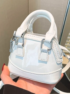 Mini white shell bag in glossy patent leather with top handles and silver hardware