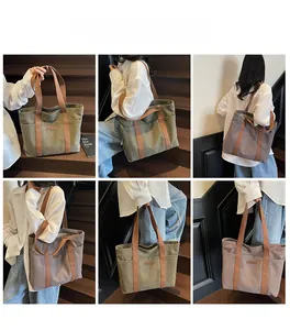 Detail shots of large canvas tote bag showing side pockets and wide shoulder straps