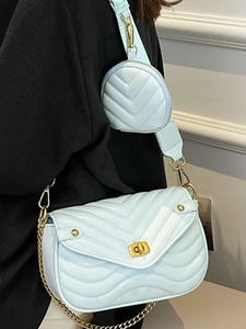 Light blue V-quilted crossbody bag for women with gold chain and matching mini pouch