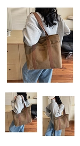 Detail view of large brown canvas tote bag featuring front pockets and premium leather patch