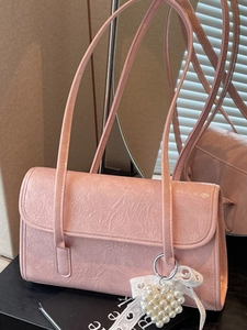Pink glossy PU leather underarm bag with pleated texture and pearl heart charm