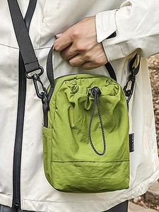 Lightweight lime green drawstring bucket bag for hiking and outdoor cycling commute