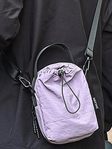 Lavender purple drawstring bucket bag in nylon with adjustable strap for hiking