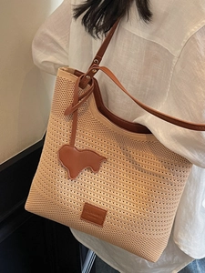 Summer knit tote bag with wave pattern, brown leather straps and animal charm