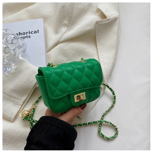 Detail of lime green quilted mini crossbody bag with gold turn-lock and chain strap